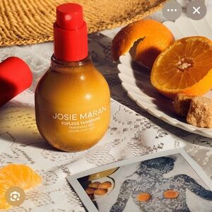 JOSIE MARAN Topless Tangerine Fragrance  tried on wrist but smell not for me